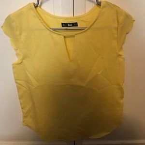 Yellow blouse.